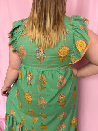 woman wearing green dress