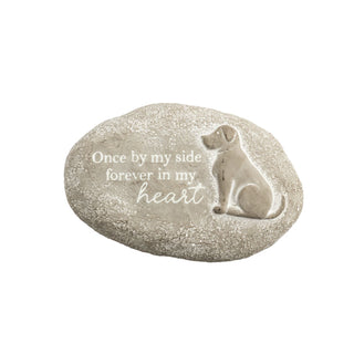 Decorative stone with a dog engraving and text 'Once by my side forever in my heart' on a white background