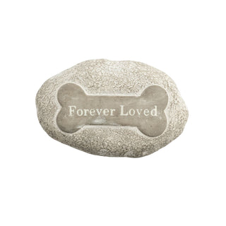 Decorative stone with 'Forever Loved' engraved on a white background