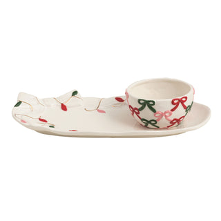 Ceramic dish set with a bowl and tray featuring festive designs on a white background
