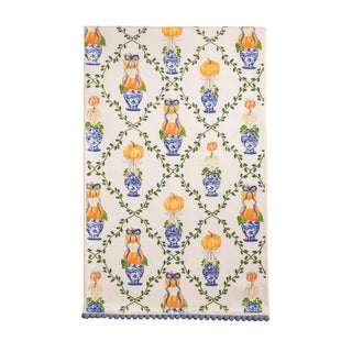 Decorative rug with pumpkin and vase pattern on a white background