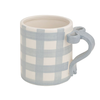 Mug with blue and white checkered pattern on a white background
