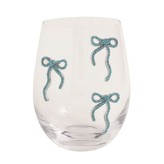 Clear glass with blue bow decorations on a white background