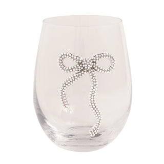 Clear glass with a decorative bow design on a white background