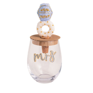 Clear glass with decorative top and 'Mrs.' text on a white background