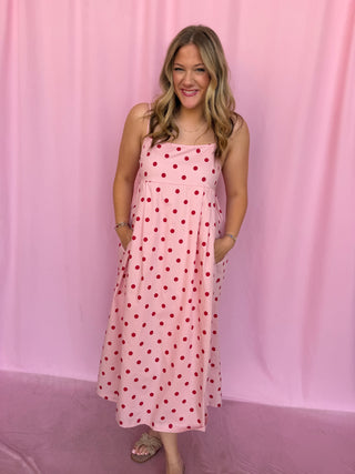 girl wearing a polka dot dress