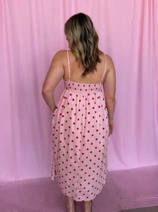 girl wearing a polka dot dress