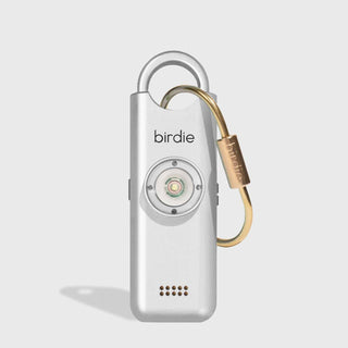 Silver and gold device with 'birdie' branding on a light gray background