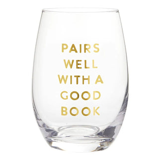 Clear glass with gold text 'PAIRS WELL WITH A GOOD BOOK' on a white background