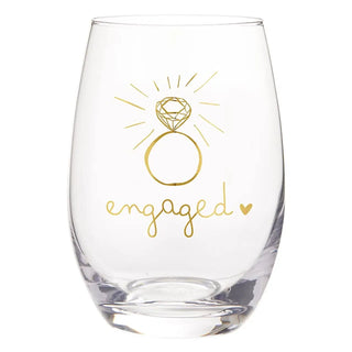 Clear glass with gold 'engaged' design on a white background
