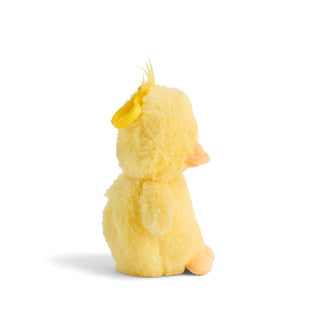 Yellow plush duck toy on a white background