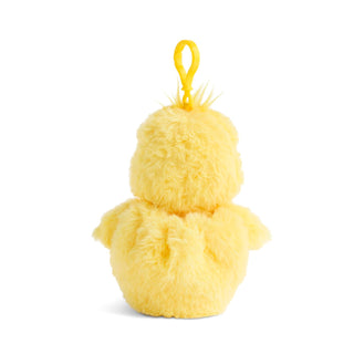 Yellow plush duck keychain on a white background