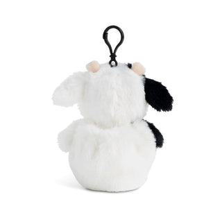 Plush dog toy with a black and white color scheme on a white background