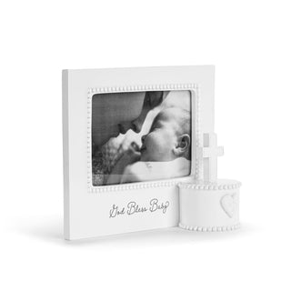 White photo frame with a baby picture and decorative elements on a white background