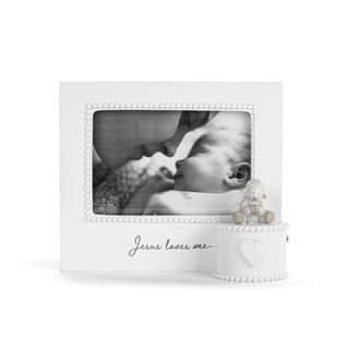 White photo frame with 'Jesus loves me' text containing a baby photo and teddy bear on a white background