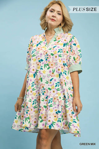 Woman wearing a floral dress with a blue background