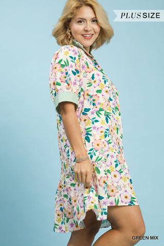 Woman wearing a floral dress with a blue background