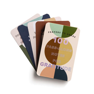 Set of cards with colorful designs and text on a white background