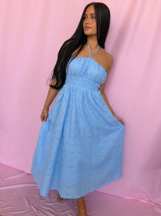 woman wearing a blue dress
