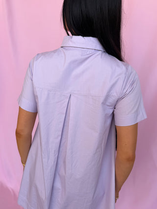 woman wearing a purple dress