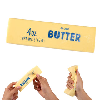 Butter stick with '4 oz. Salted Butter' text held by hands on a white background