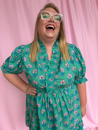 woman wearing a short floral dress 