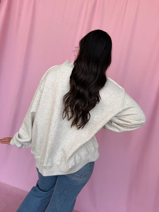 girl wearing a WWJD mockneck