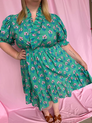 woman wearing a short floral dress 