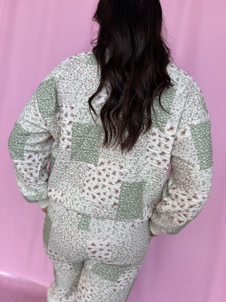 girl wearing a quilted set