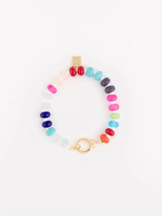 Multicolored beaded bracelet with gold clasp on a white background