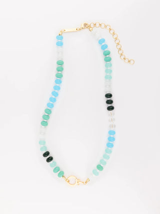 Necklace with multicolored beads on a white background