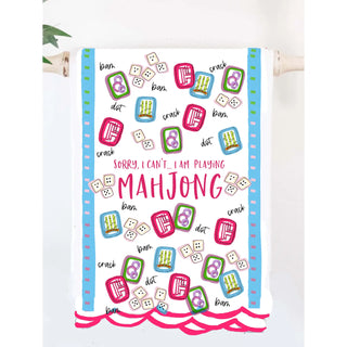 Tea towel with colorful Mahjong design and text on a white background