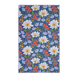 Floral patterned towel with colorful flowers on a blue background