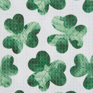 Green four-leaf clover pattern on a white background