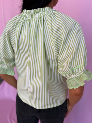 woman wearing polka dot top