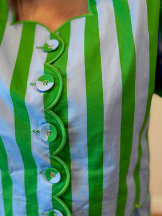 Green and white striped shirt with decorative buttons