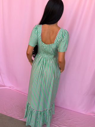woman wearing green dress