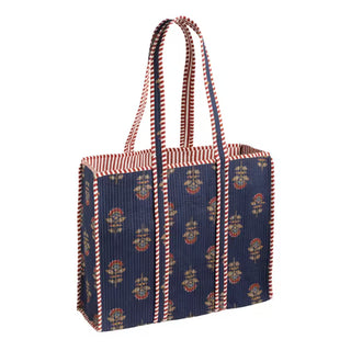 Tote bag with floral pattern and striped handles on a white background