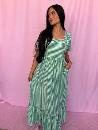 woman wearing green dress
