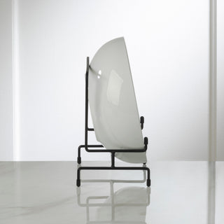 Modern chair with a curved backrest on a white background