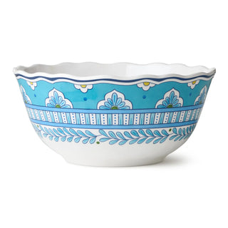 Decorative ceramic bowl with blue and white pattern on a white background