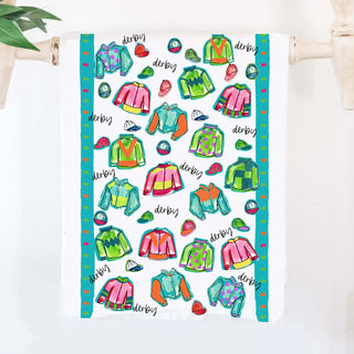 Tea towel with colorful jacket illustrations and 'derby' text on a white background