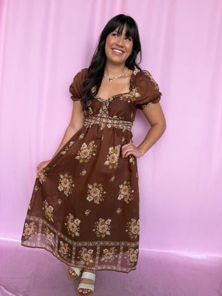 Girl wearing a brown dress