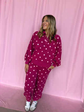 girl wearing a polka dot set 