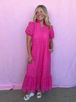 woman wearing pink midi dress