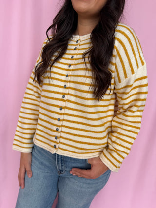 girl wearing a striped cardigan