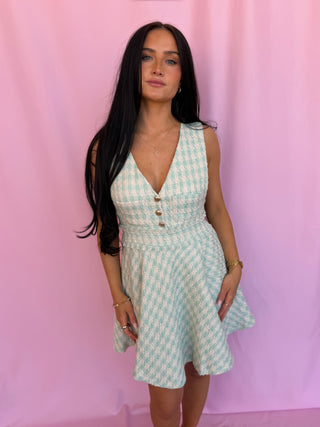 woman wearing green dress
