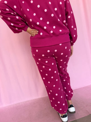 girl wearing a polka dot set 