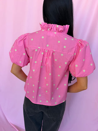 woman wearing polka dot top
