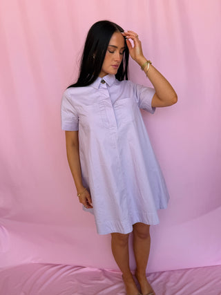 woman wearing a purple dress